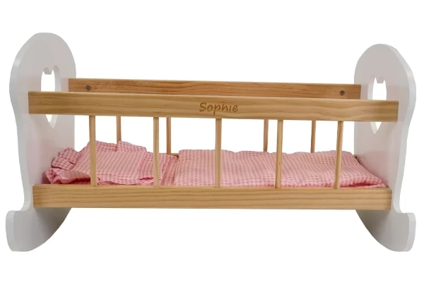 In der oberen Schiene des Puppenbettes